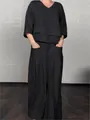 Elegant black two-piece set featuring a loose V-neck top and wide-leg trousers with pockets - S / Black
