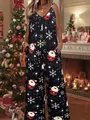 Detailed view of women's holiday jumpsuit featuring Santa Claus and snowflake motifs - Christmas Snowflake Santa