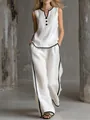 Dettaglio completo di set in lino bianco con profili neri e pantaloni a gamba larga - Taglia S / Parte Superiore e Parte Inferiore / Bianco