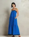 Detailed front view of a long blue spaghetti strap dress with chic black trim accents - S / Bottoms / Sapphire Blue