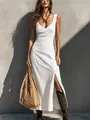 Elegant white ribbed sleeveless maxi dress featuring a deep V-neckline and high side slit detail. - S / Tops / White