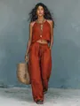 Detailed view of a terracotta bohemian style two-piece linen set worn by a fashion model - S / Top And Bottom / Burgundy