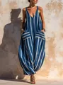 Detailed shot of blue and white striped cotton linen jumpsuit with V-neck - S / Top And Bottom / Dark Blue