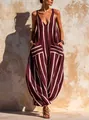 Detail of a chic wine red vertical stripe V-neck jumpsuit with a relaxed wide-leg fit - S / Top And Bottom / Burgundy