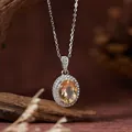 Close-up of natural oval citrine pendant necklace in S925 sterling silver with halo stones. - Natural Citrine Pendant (With Chain)