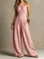 Detailed view of pink halter cross neck knitted jumpsuit with elegant wide leg cut. - Pink
