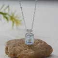 Detailed macro view of a square light blue topaz pendant set in S925 sterling silver - Natural Topaz / Natural Topaz Pendant With Necklace