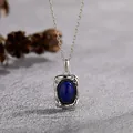 Close-up of a vintage S925 silver necklace featuring a dark blue lapis lazuli stone. - Lapis Lazuli-Silver
