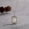 Close-up of S925 silver necklace featuring a vintage oval white mother-of-pearl pendant. - Mother of Pearl-Silver