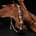 Close-up of S925 silver bracelet with yellow citrine in a halo diamond setting - Bezel Design / Citrine Yellow