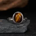 Macro detail of natural oval tiger's eye gemstone set in a vintage silver ring band. - Open Size (LR324-1) / Natural Tiger Eye Stone