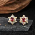 Detailed macro view of exquisite S925 silver stud earrings with red garnet stone - Natural Ruby (LN375) / Stud Earrings