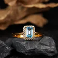 Macro view of gold-plated S925 silver ring featuring a rectangular blue topaz - Natural Topaz Ring / Gold