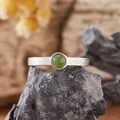 Close-up of a natural green nephrite jade ring with textured S925 silver band - Natural Jasper / Silver
