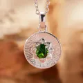 Macro close-up view of S925 sterling silver pendant featuring an oval green diopside gemstone. - Natural Diopside (Silver)