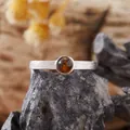 Macro detail of S925 sterling silver ring with tiger eye stone and bark texture - Natural Tiger Eye Stone / Silver