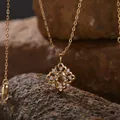 Nahaufnahme einer eleganten vergoldeten S925 Silberhalskette mit Citrin-Anhänger - Natürlicher Citrin Halskette / Gold