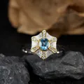 Vista dettagliata di un anello in argento sterling con topazio blu naturale e design a stella. - Topazio Naturale (LR375) / Anello