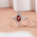 Close-up of S925 sterling silver ring featuring a four-point star design and red gemstone - Four-pointed Star Style (R421) / Natural Garnet