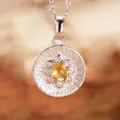 Close-up detail of the S925 sterling silver necklace with a yellow gemstone pendant - Natural Citrine (Silver)
