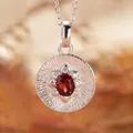 Macro view of S925 sterling silver necklace pendant with oval red garnet stone - Natural Garnet (Silver)