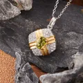 Detailed view of s925 silver pendant with green gemstone and gold cross design - Natural Peridot (N457)