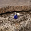 Detailed view of the blue lapis lazuli stone and sterling silver sunburst ring on stone - Open Adjustable / Natural Lapis Lazuli