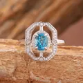 Detailed macro view of an octagonal sterling silver ring with a blue topaz gemstone - Adjustable Ring (R521) / Natural Topaz Ring