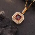 Detailed macro shot of a square red gemstone pendant with double sparkling stone halos - Natural Garnet / Gold