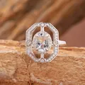 Elegante anello in argento sterling con pietra ovale azzurra e alone di cristalli scintillanti. - Anello con Acquamarina