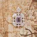 Macro view of sterling silver amethyst pendant with detailed brushed feather leaf elements - Amethyst (N490) / Natural Amethyst Necklace