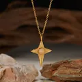 Close-up of gold star pendant necklace with a round natural opal gemstone center. - Natural Opal Gold