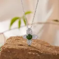 Detailed macro view of S925 sterling silver necklace featuring a green jade clover charm - Natural Jasper Necklace / Silver