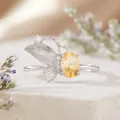 Detailed macro view of S925 silver butterfly ring featuring an oval citrine gemstone - Natural Citrine Ring