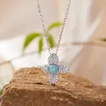 Detailed view of a S925 sterling silver necklace featuring a light blue stone flower pendant - Natural Larimar Necklace / Silver