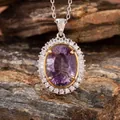 Exquisite close-up detail of a millennium cut oval amethyst pendant in S925 silver - Natural Millennium Cut Amethyst Necklace / Purple