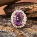 Close-up of a luxury S925 silver necklace with a large oval purple amethyst stone. - Natural Millennium Cut Amethyst Rings