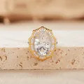 Detailed macro view of a Victorian style oval white gemstone ring with a double-layer halo - Natural Millennium Cut White Crystal