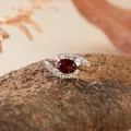 Elegant S925 sterling silver ring with a vibrant oval red gemstone set on a natural stone - Garnet