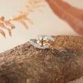 Elegant S925 sterling silver ring with an oval yellow citrine gemstone on a natural rock setting - Citrine