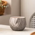 Close-up of marble texture ceramic succulent pot with geometric diamond shape - Geometric Rhombus / Black Marble Pattern