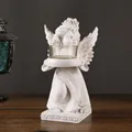 Vintage European style resin angel candle holder with glass cup for home decor - Angel Candlestick - Right Facing