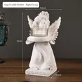 Vintage European style resin angel candle holder with glass cup for home decor - Angel Candlestick - Right Facing
