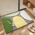 Tappetino da bagno trapuntato con forme geometriche e scritta Smile verde e giallo - 40*60cm / Pietre a Quattro Colori