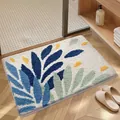 High-quality soft tufted floral bathroom mat with vibrant blue and green leaf patterns - 40*60cm / Dancing Leaves