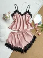 Elegant roze satijnen pyjamaset met zwarte kant voor dames, hemdje en korte broek - S / Boven- En Onderstuk / Lotusroze