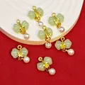 Detailed view of bow knot pendants with faux jade and pearls for DIY jewelry crafts - Light Green (B546#)