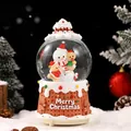 Festive Christmas snow globe music box featuring snowman and gingerbread man figures. - 80# Gingerbread House Snowman (Light + Music)
