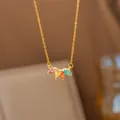 Elegant gold chain necklace featuring a colorful marquise-cut stone laurel leaf pendant - Colorful Zirconia Leaves Necklace (8413)