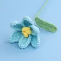 Handmade blue crocheted tulip flower made of soft yarn, perfect for gift decoration. - Flowering Tulip (Crochet Core) / Sky Blue